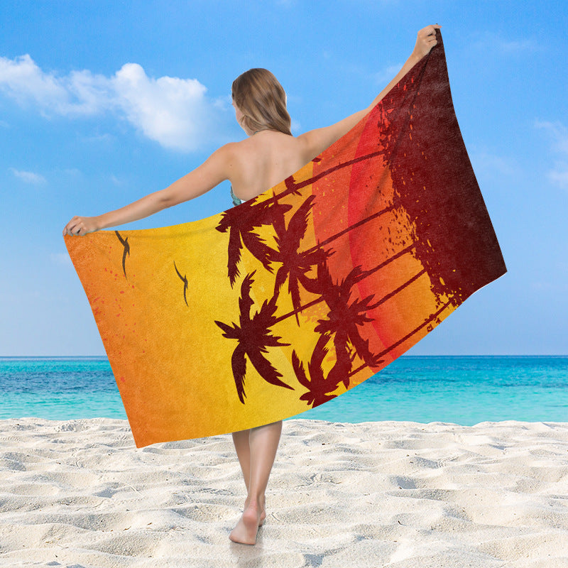 Women's beach towel with vibrant palm motif Skanto
