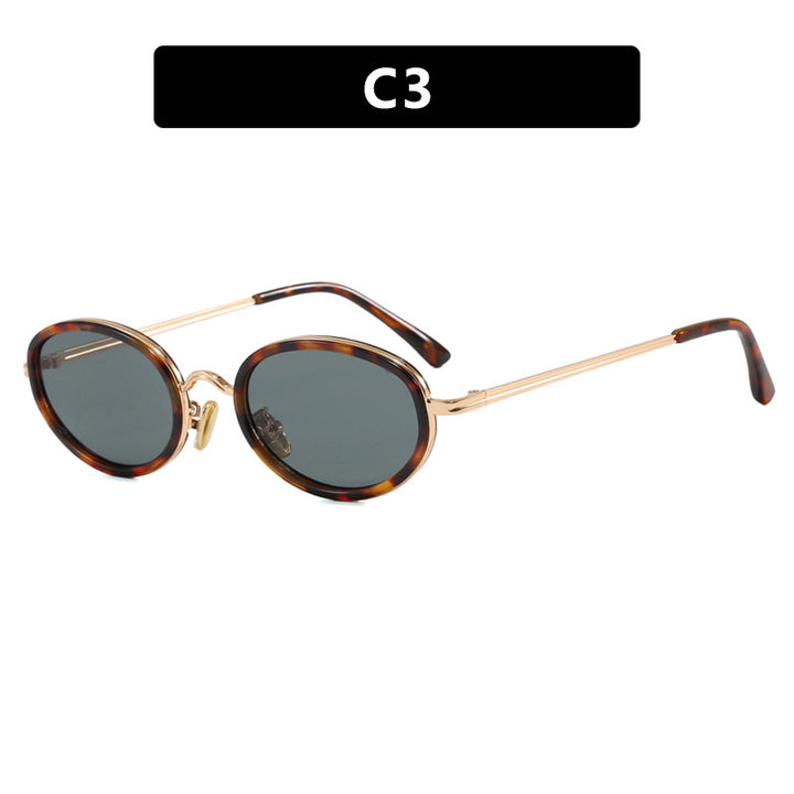 Dame elegant rund solbrille med moderne metallramme Skanto