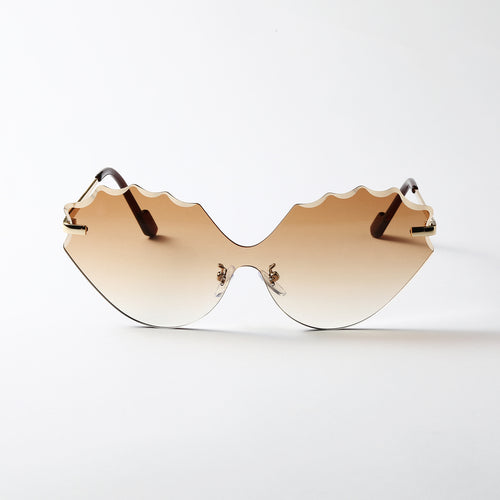 Dame solbrille med unik bølgedesign Skanto