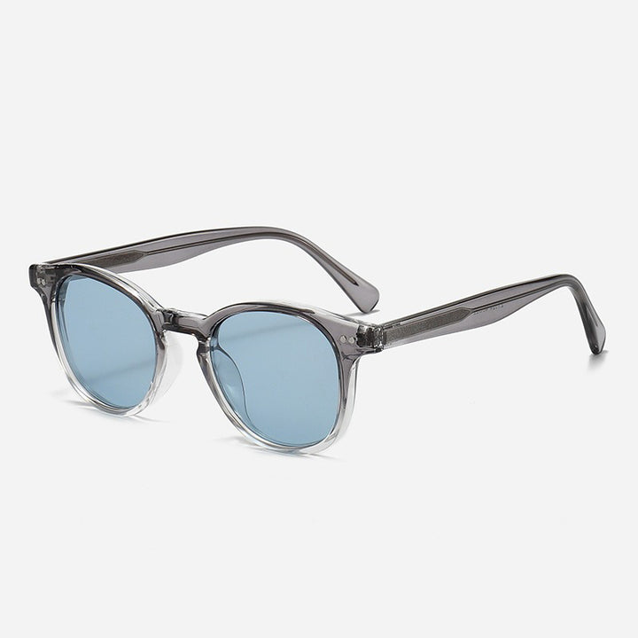 Dame Rund solbrille med stilfullt mønster og UV-beskyttelse Skanto