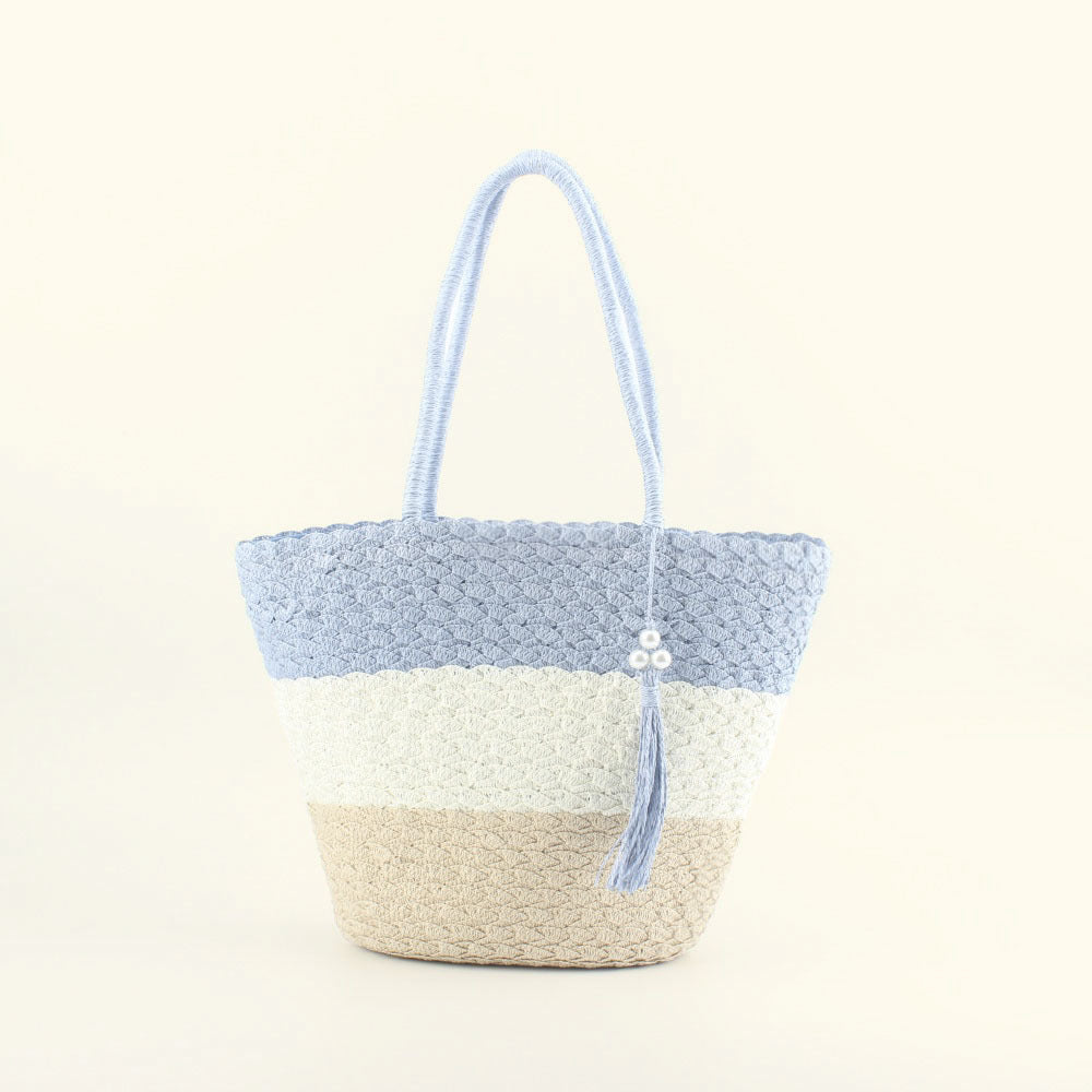 Moderne hekle-crossbody-veske med dusker Skanto