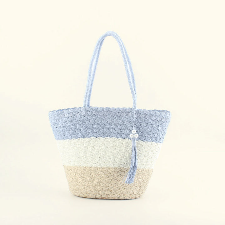 Moderne hekle-crossbody-veske med dusker Skanto