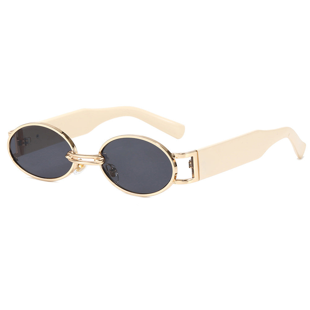 Dame moteriktig solbrille i oval design Skanto