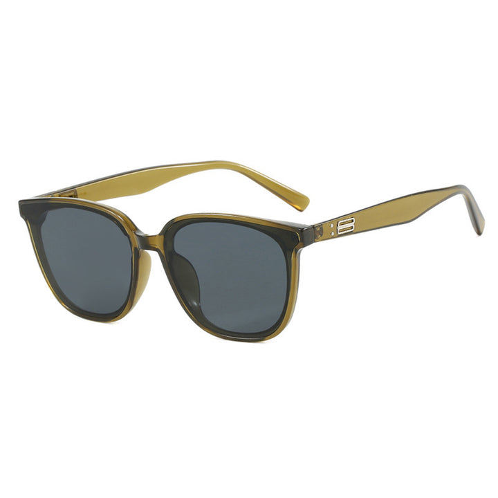 Dame elegant solbrille med trendy gjennomsiktig ramme Skanto