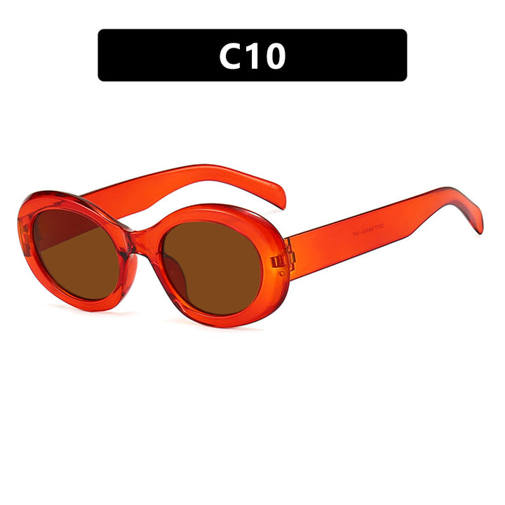 Dame moteriktig solbrille i original oval design med transparent ramme og UV-beskyttelse Skanto