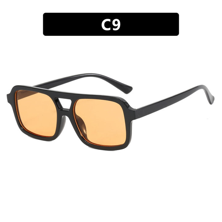 Dame moderne solbriller i elegant rektangulært format Skanto