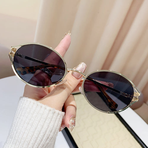 Dame elegant Cat-Eye solbriller med fin metallramme Skanto