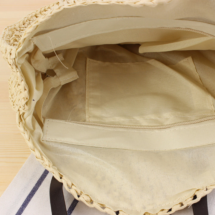 Rund bast bærenett med lærdekorert håndtak Skanto