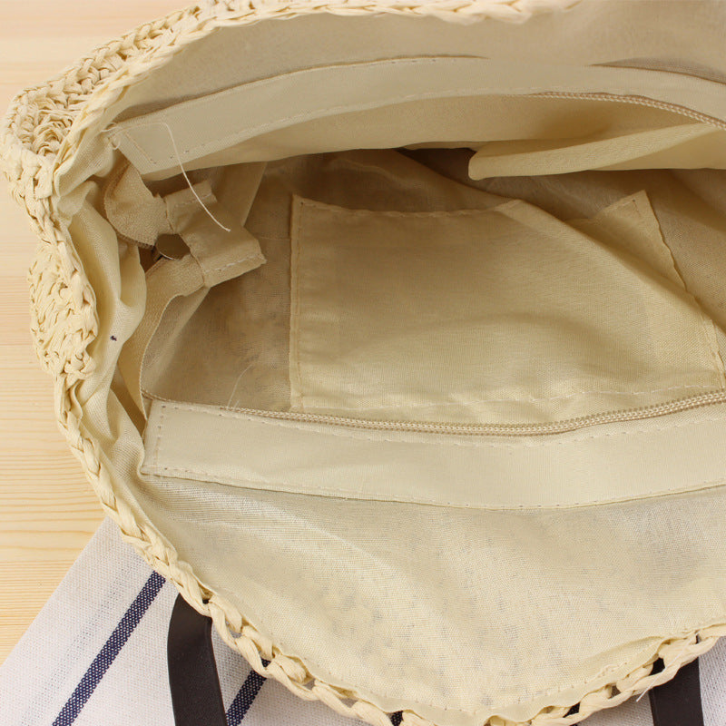 Round basket bag with sturdy leather handles Skanto
