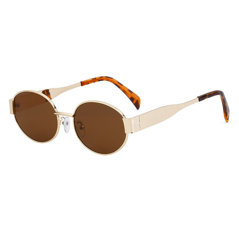 Dame moteriktig solbrille i elegant oval design Skanto