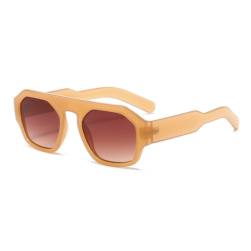 Dame motetrender solbrille i innovativ geometrisk design Skanto