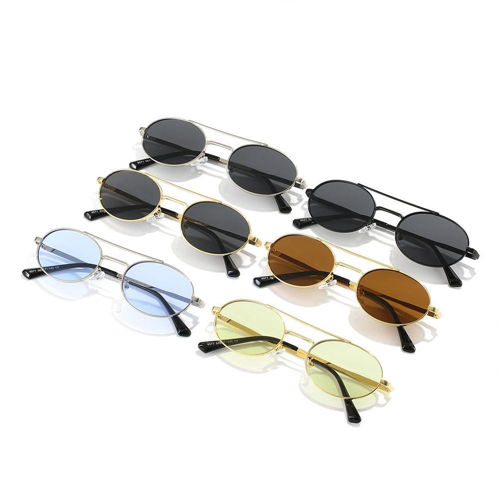 Damer Modis oval solbriller i minimalistisk design Skanto