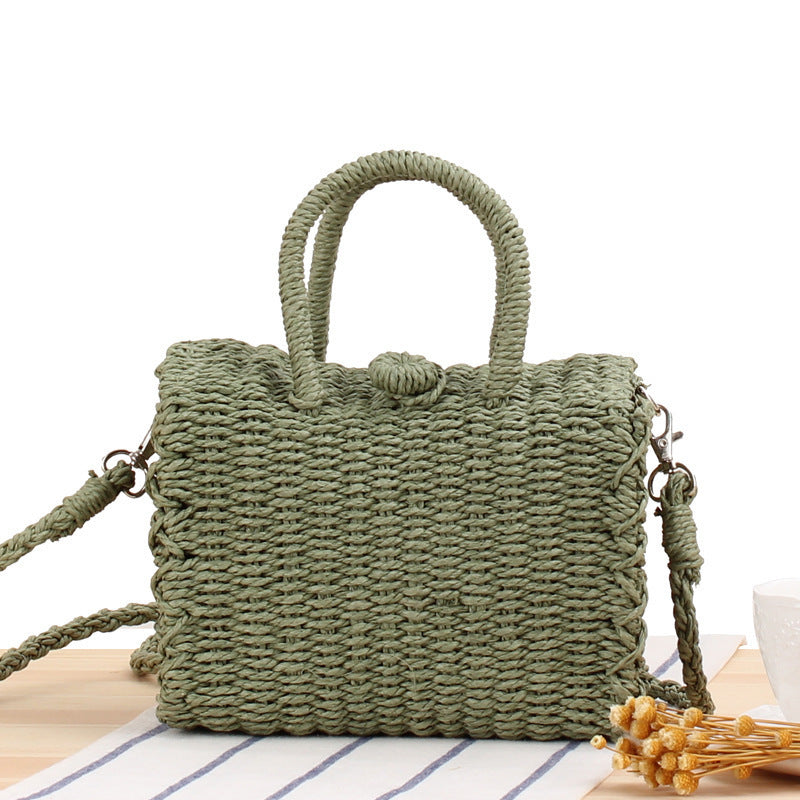 Woven natural material handbag with practical shoulder strap Skanto