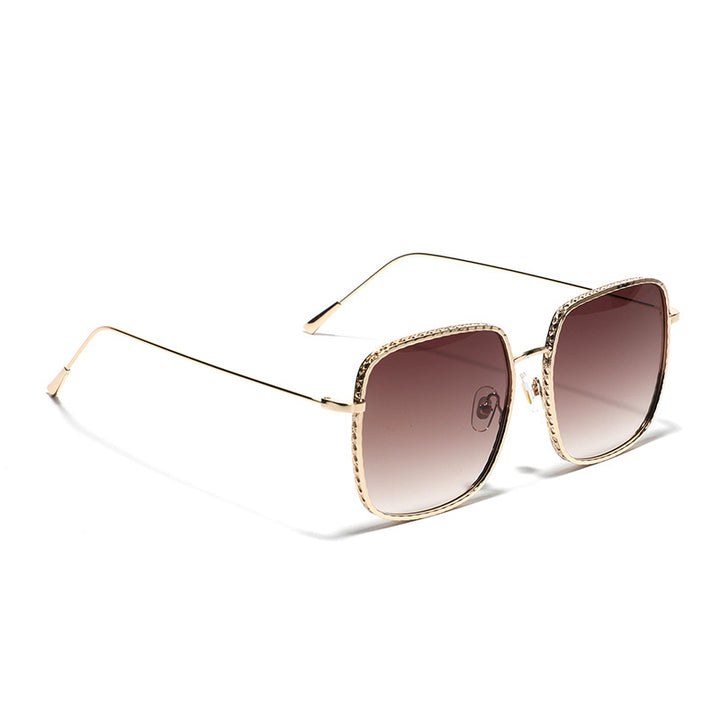 Damer oversized solbriller med elegante detaljer Skanto