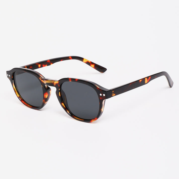 Dame solbrille i stilfullt skilpadde-design Skanto