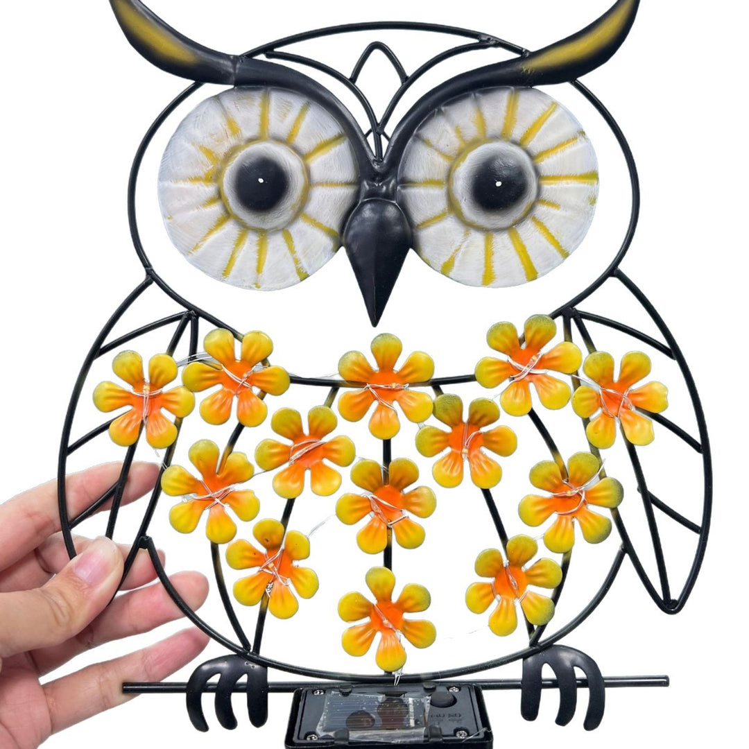 Decorative Metal Bee Wall Light with Integrated Fairy LED Lamp and Solar Module Skanto