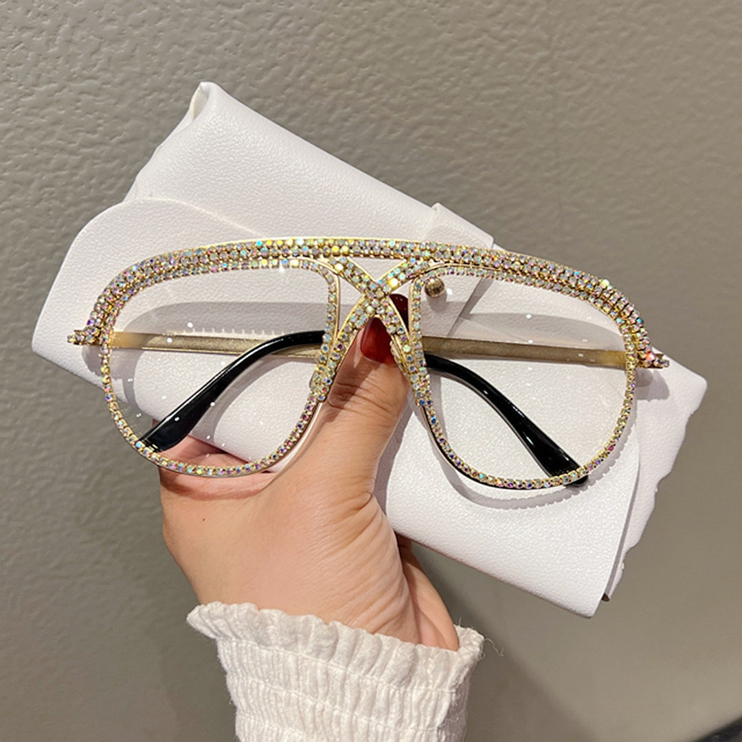 Dame Glamorøs oversized solbrille med glitrende krystallramme Skanto