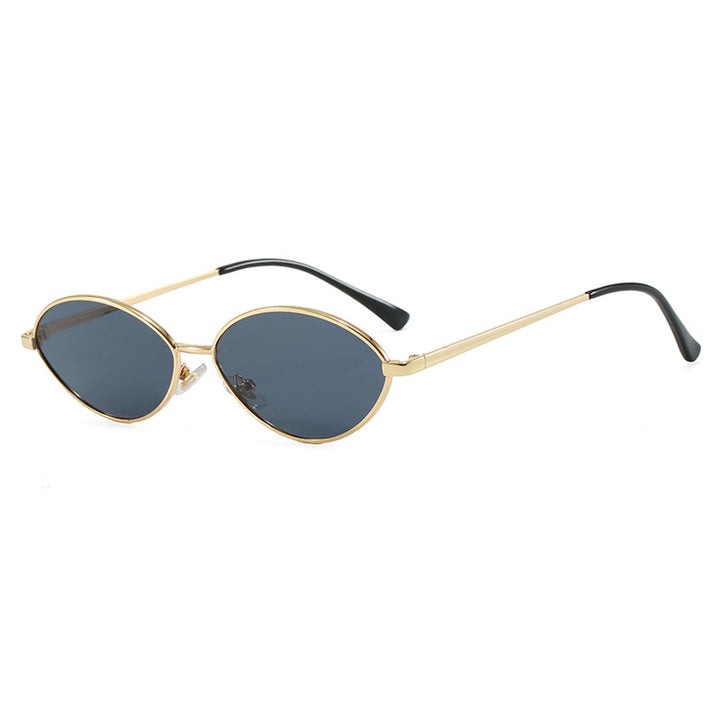 Dame moteriktig solbrille med ovalt design og polariserte linser Skanto
