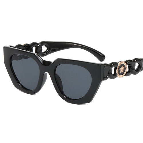 Dame moteriktig solbrille med ekstravagant design og luksuriøse detaljer Skanto