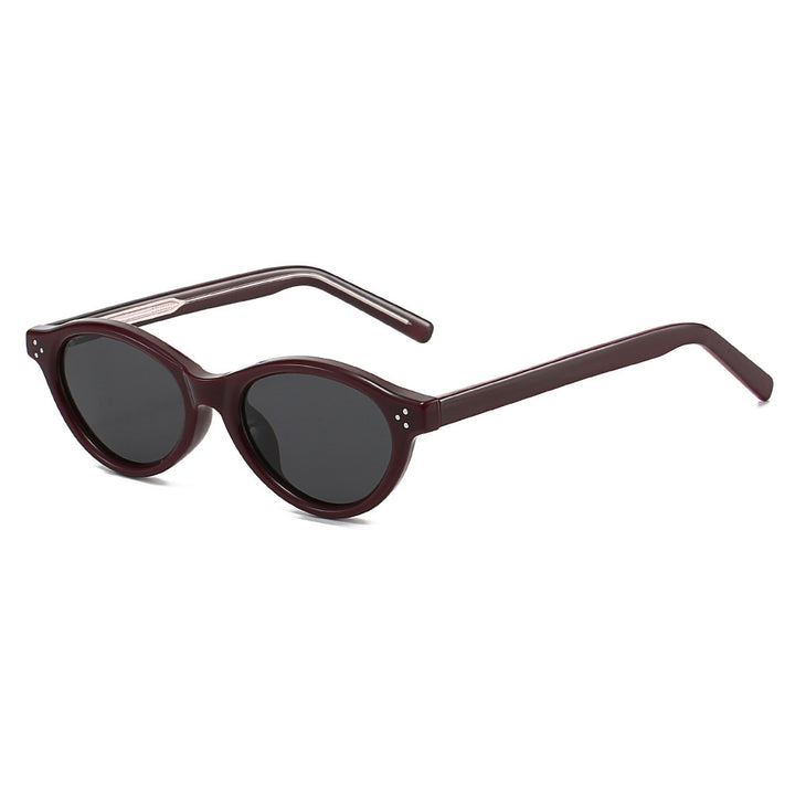 Dame Cat-Eye solbriller med elegant, transparent ramme og UV400-beskyttelse Skanto