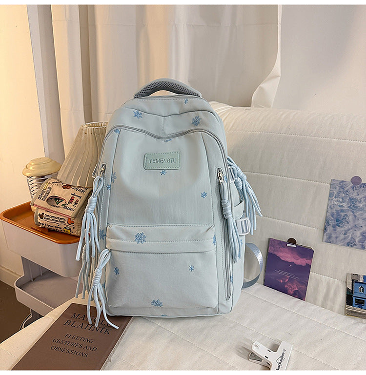 Elegant brodert skole ryggsekk