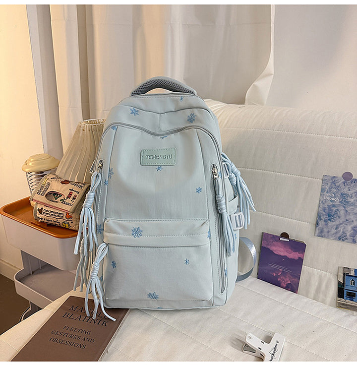 Elegant brodert skole ryggsekk