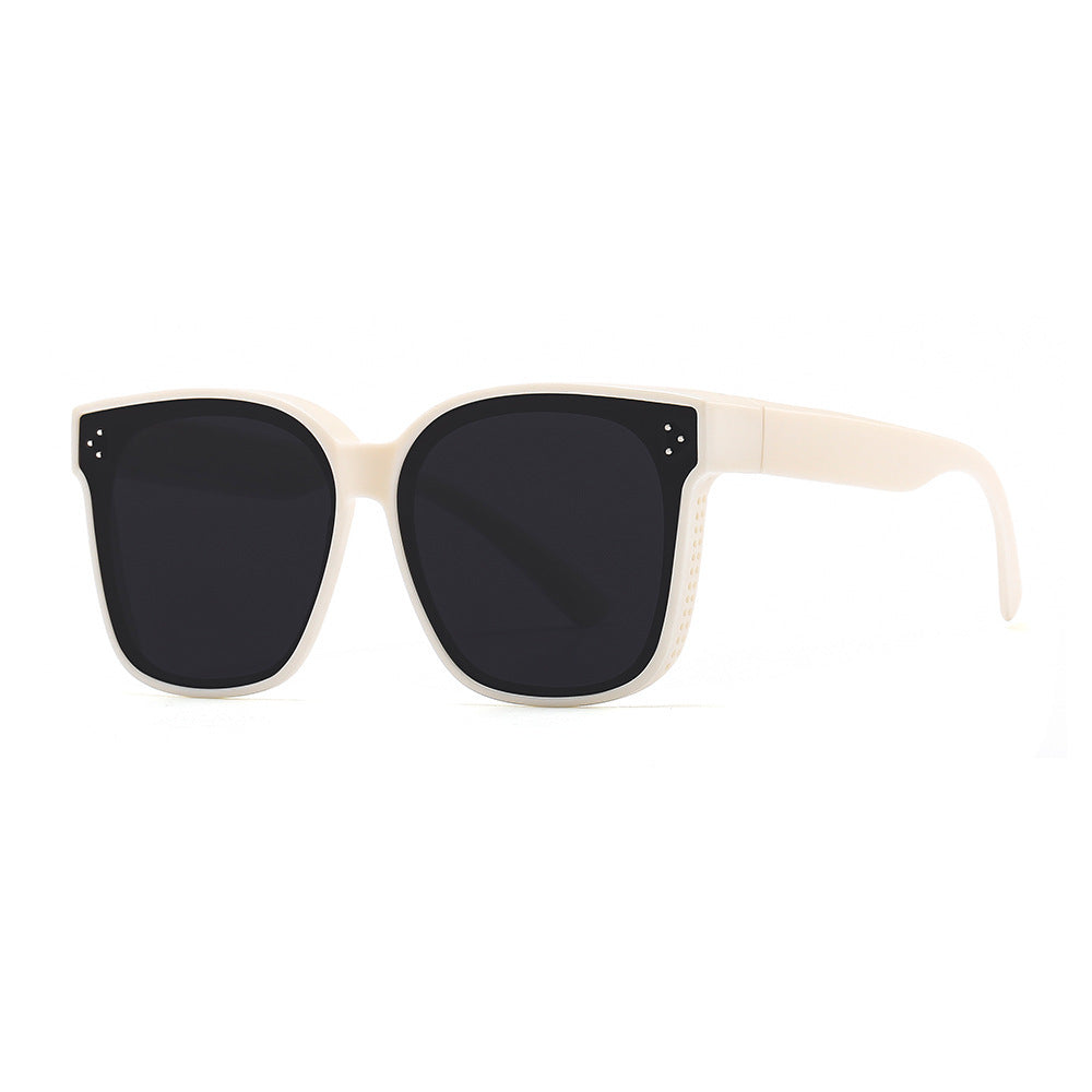 Dame firkantet solbrille med beskyttende UV-filter og stilfull ramme Skanto