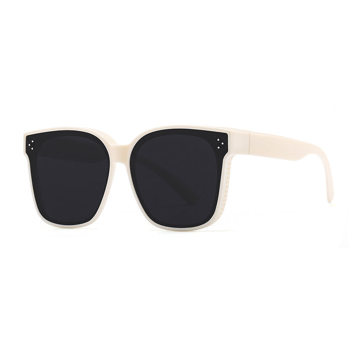 Dame firkantet solbrille med beskyttende UV-filter og stilfull ramme Skanto