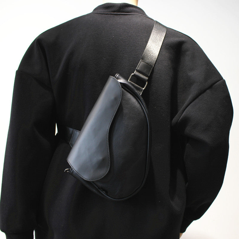 Elegant skulderveske med innovativ lukking Skanto