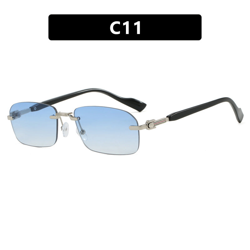 Dame solbrille med elegant metallramme og stilige tre detaljer Skanto
