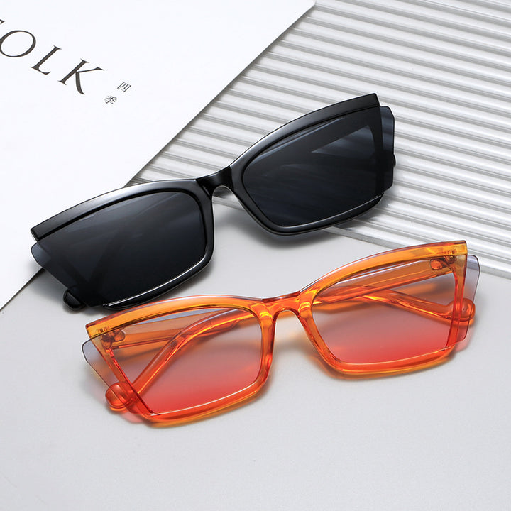 Dame moteriktig solbrille med unikt rektangulært design og UV-beskyttelse Skanto