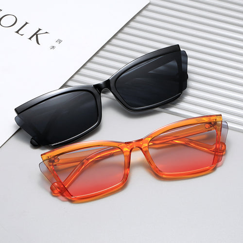 Dame moteriktig solbrille med unikt rektangulært design og UV-beskyttelse Skanto
