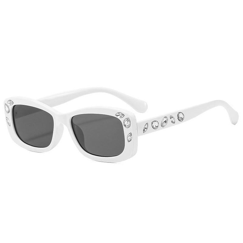 Dame moteriktig solbrille med krystallpynt Skanto