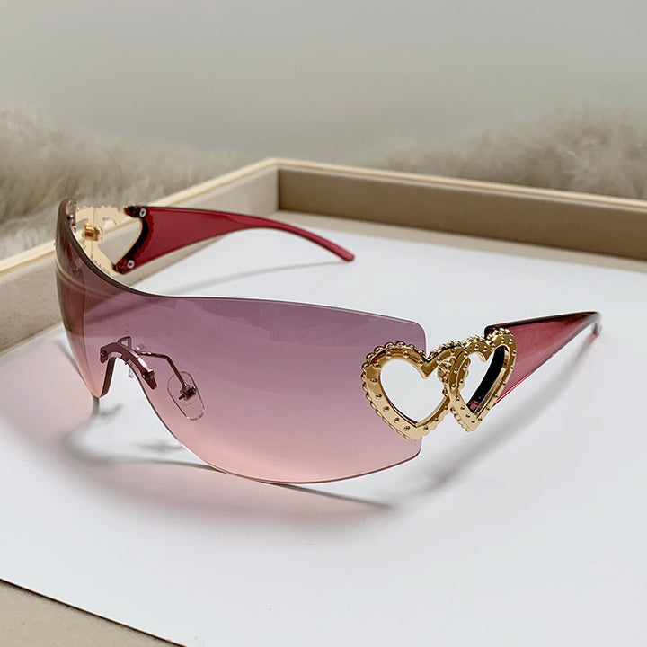 Dame designer-solbrille med luksuriøs hjerte-akseent Skanto