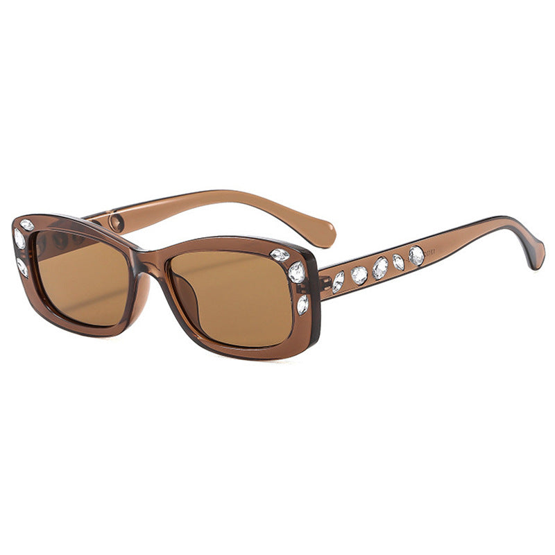 Dame moteriktig solbrille med krystallpynt Skanto