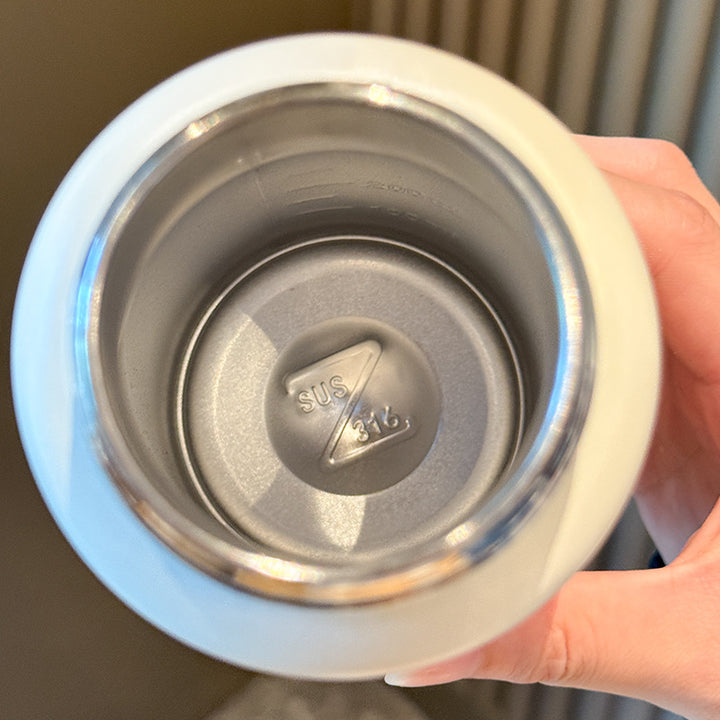 Dame isolert drikkeflaske med dyrevennlig design Skanto