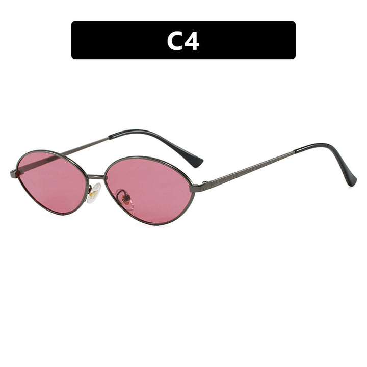 Dame moteriktig solbrille med ovalt design og polariserte linser Skanto