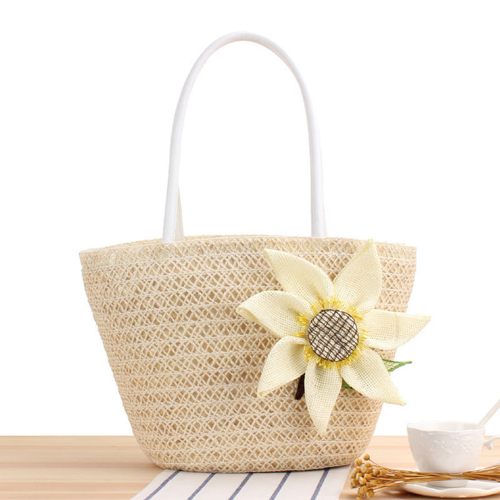 Handbag with floral appliqué in natural material Skanto