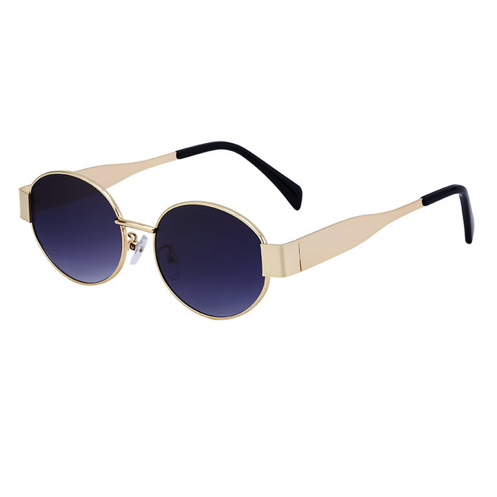 Dame moteriktig solbrille i elegant oval design Skanto