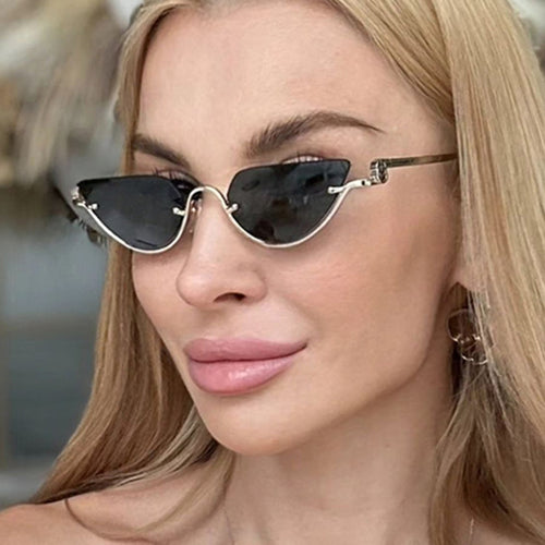 Dame Cat-Eye solbriller med gullfarget metallramme og UV-beskyttelse Skanto