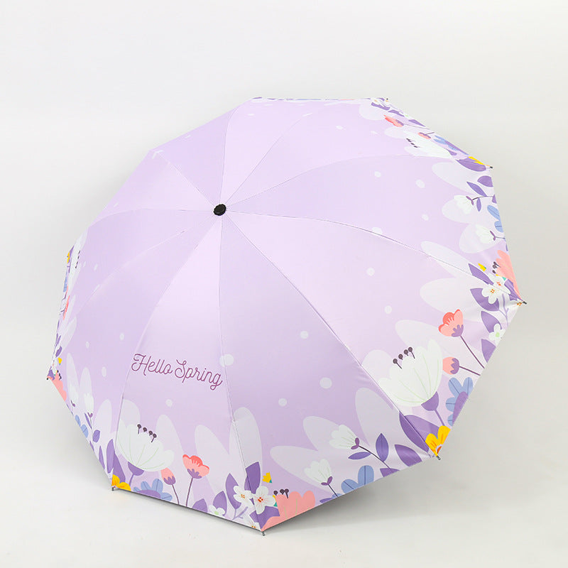 Kvinnes sammenleggbare paraply med blomsterdesign Skanto