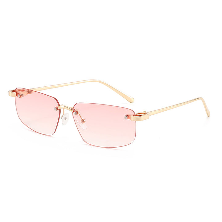 Dame moteriktig rektangulær solbrille med minimalistisk ramme Skanto