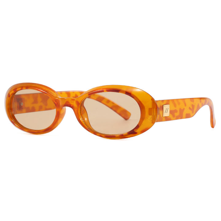 Dame eksklusiv solbrille i elegant ovalt design Skanto