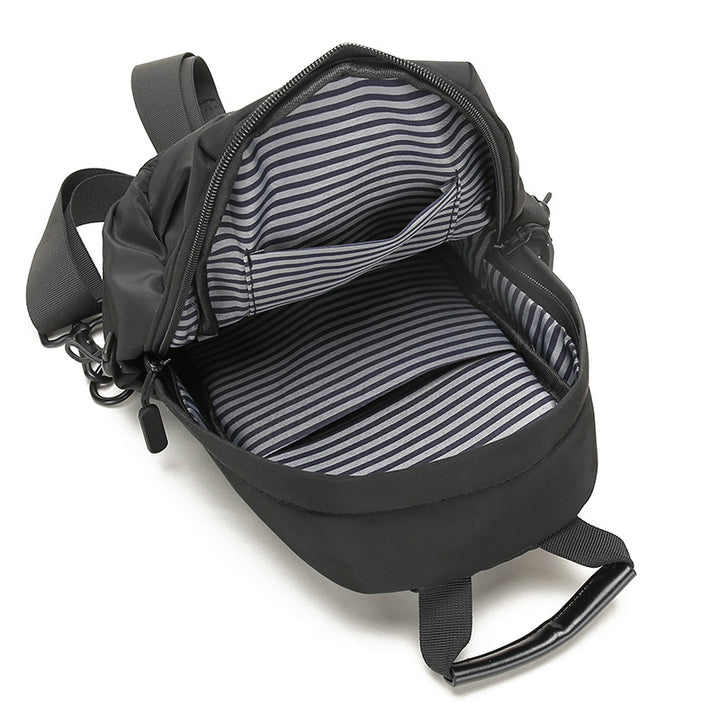 Sling-veske med multifunksjonelt design Skanto