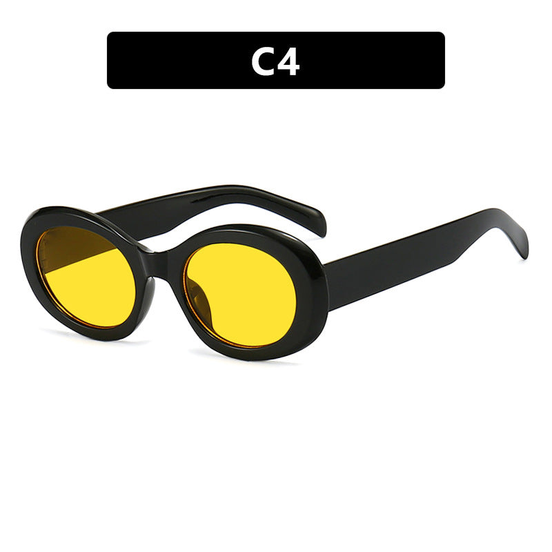 Dame moteriktig solbrille i original oval design med transparent ramme og UV-beskyttelse Skanto