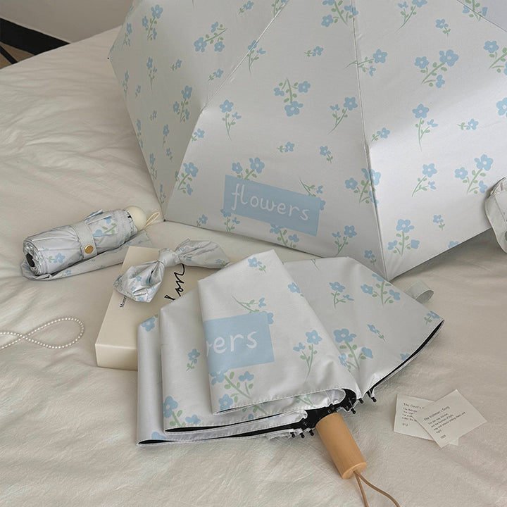 Damer Faltende Paraply med stilfullt blomsterdesign Skanto
