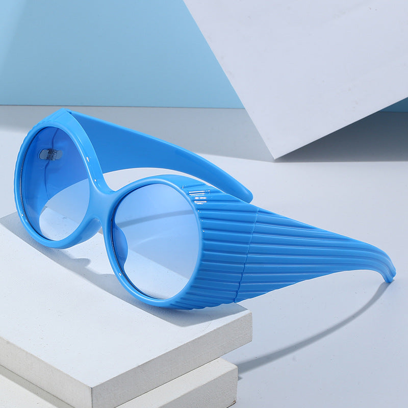 Dame Ekstravagant Solbrille med unikt bølgedesign Skanto