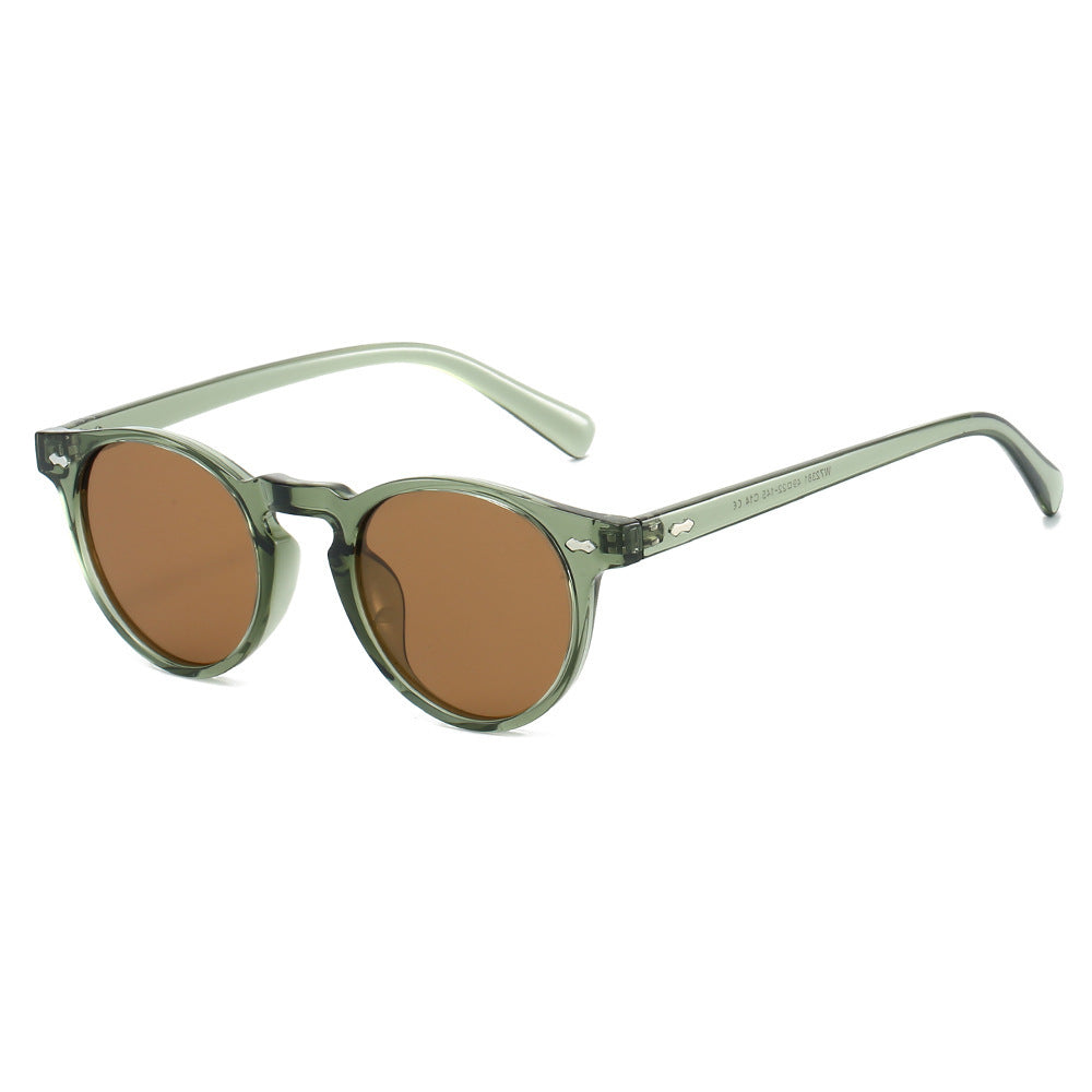 Dame vintage solbriller med runde glass og transparent ramme Skanto