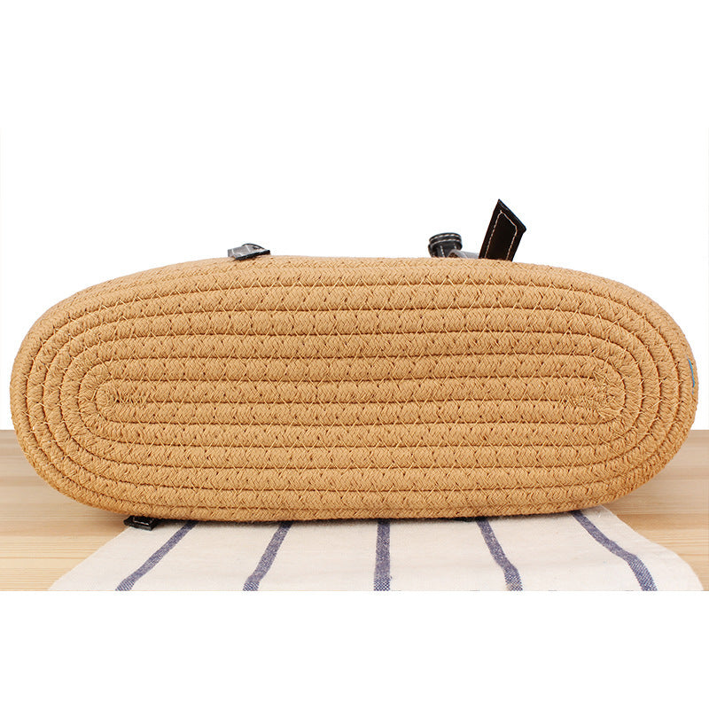 Elegant Beach Bag in Woven Natural Material with Stylish Leather Accents Skanto