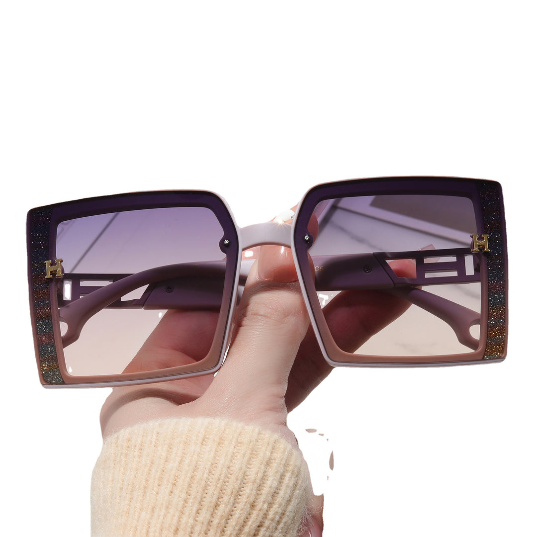 Dame trendy solbrille med ekstravagant, rektangulær ramme Skanto